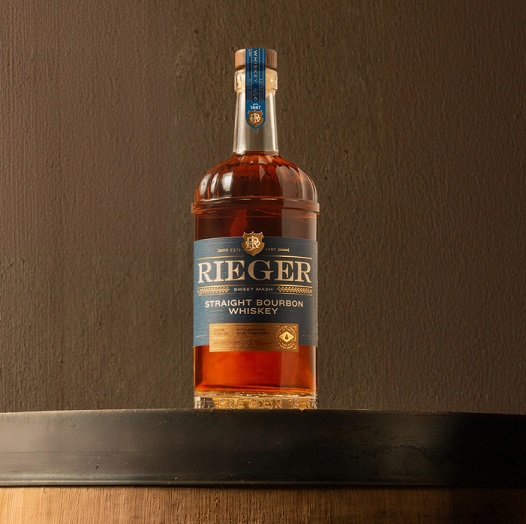 J. Rieger Straight Bourbon bottle on barrel